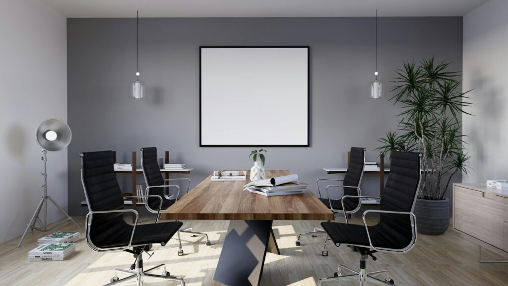 Sleek and modern conference room with minimalist design featuring stylish furniture and indoor plants.
